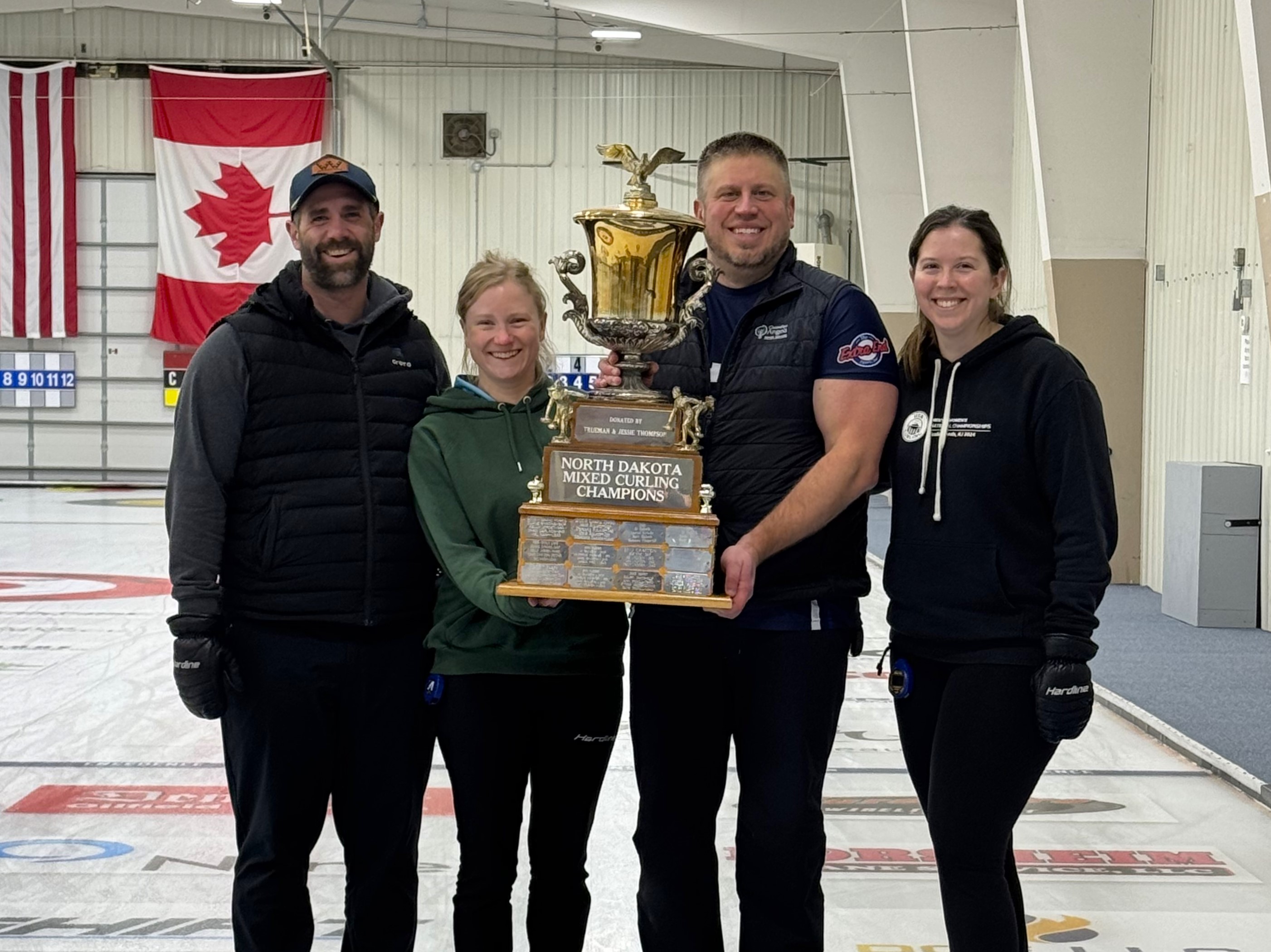 A group of people standing togetherDescription automatically generated